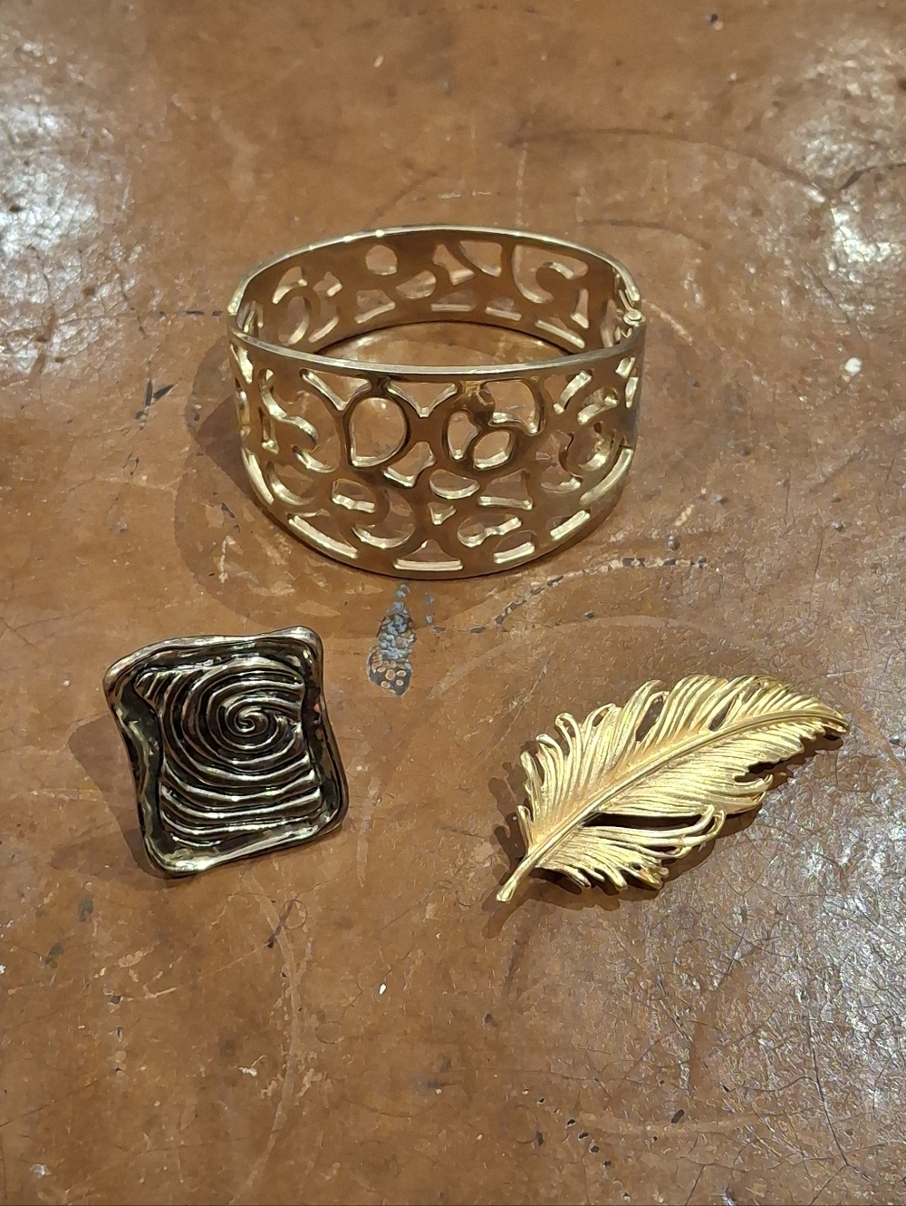 Lot Of Gold Tone Ring, Snap Cuff Bracelet, Feather Brooch